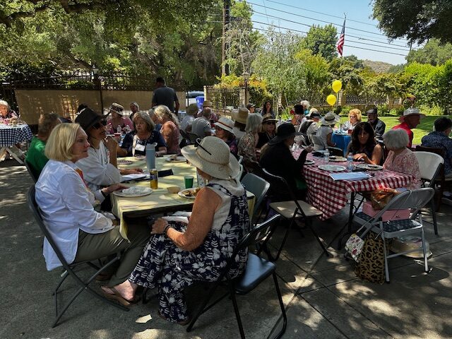 The brunch area was perfectly shaded by massive trees.