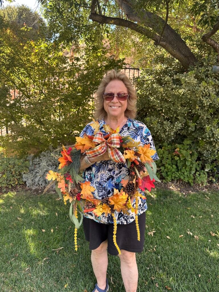 Julie shows off her wreath