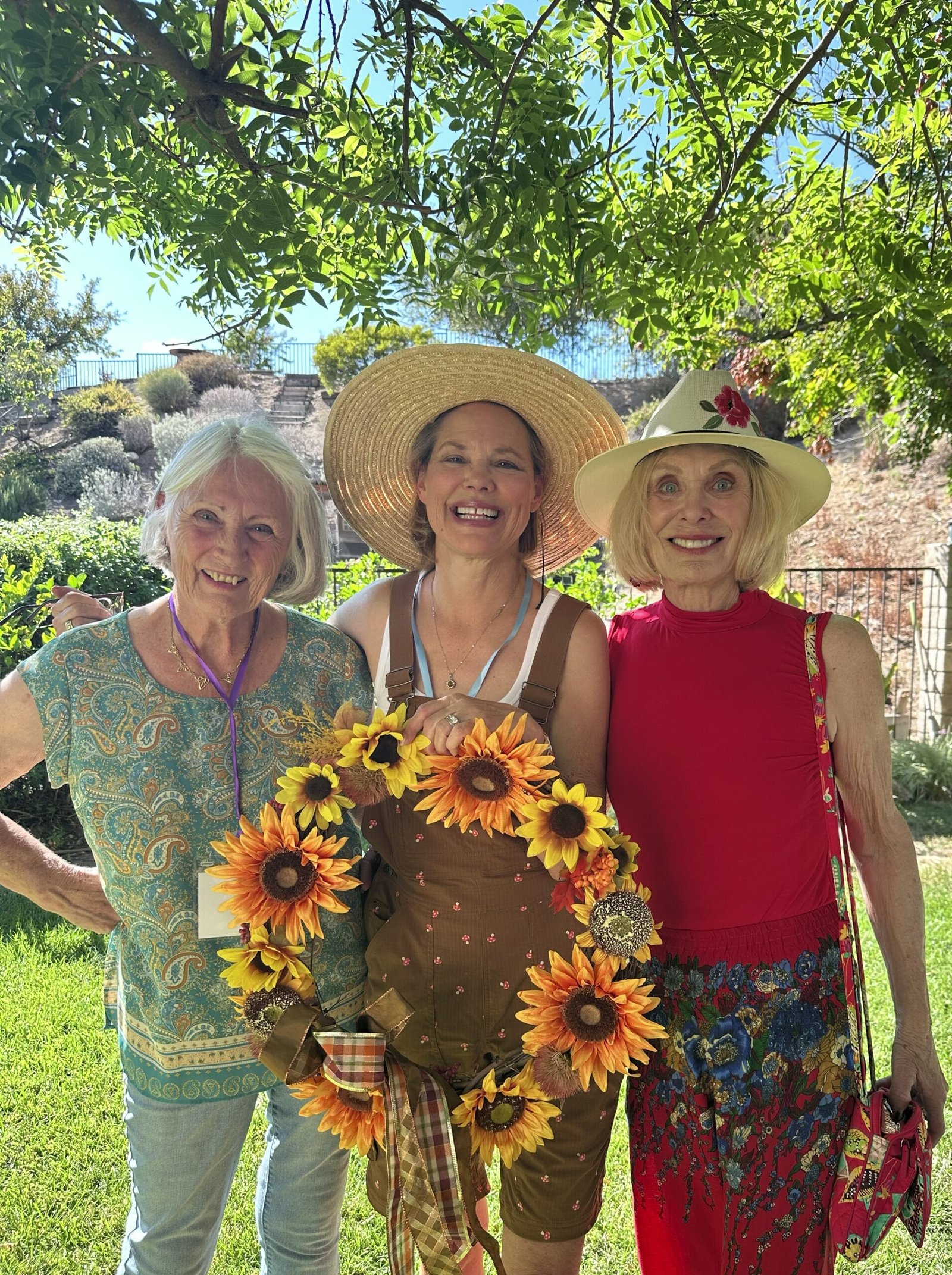 Pam and Laurie admire Marilyn's beautiful wreath