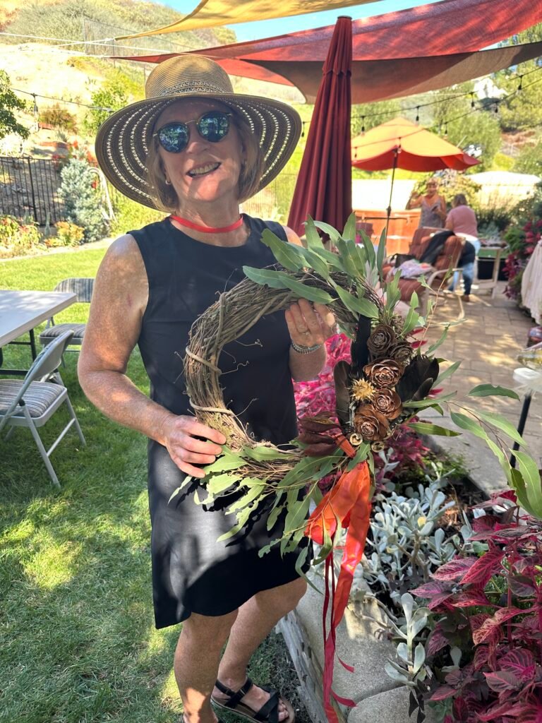 Debra K. shows off her wreath
